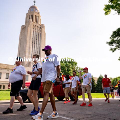University of Nebraska representatives walk around the Capitol during the Star City Pride parade. June 18, 2022. Photo by Jordan Opp for University Communication.