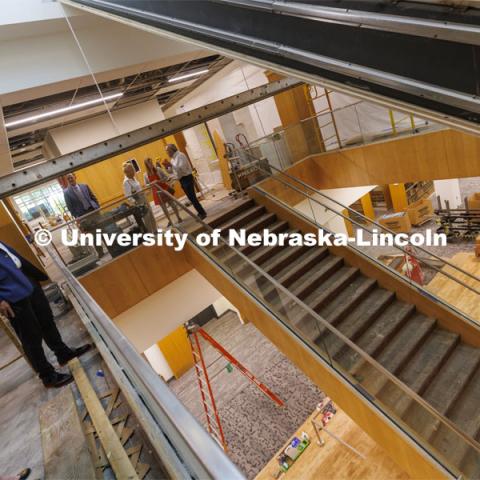A new central staircase opens the floors to light. Chancellor Ronnie Green and donors take a tour of the renovated College of Law library. The $6 million renovation of the Marvin and Virginia Schmid Law Library began in May 2021 will be open in the fall. The project will provide new and rejuvenated spaces for the community. June 22, 2022. Photo by Craig Chandler / University Communication.