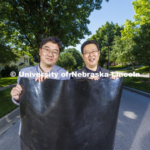 Jongwan Eun and Yunwoo Nam have developed a membrane that improve landfill gas emissions that make them and their communities better. June 28, 2022.  Photo by Craig Chandler / University Communication.