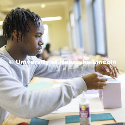 Jaylen Epting, a second-year student from Omaha, works on his design in Lloyd “Bud” Shenefelt’s d.Make summer class.  The class is re-imagining the Haymarket gallery alley.   July 1, 2022. Photo by Craig Chandler / University Communication.  