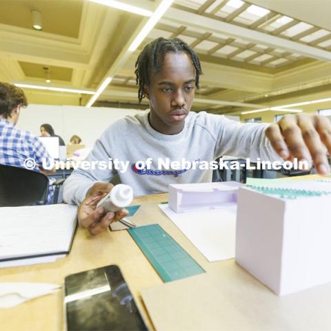 Jaylen Epting, a second-year student from Omaha, works on his design in Lloyd “Bud” Shenefelt’s d.Make summer class.  The class is re-imagining the Haymarket gallery alley.   July 1, 2022. Photo by Craig Chandler / University Communication.  