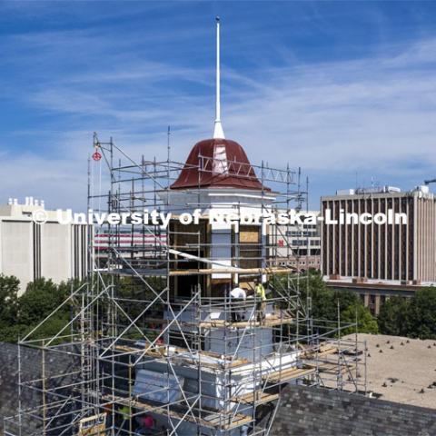 Scaffolding surrounds the Love Library Cupola during the restoration. July 15, 2022. Photo by Craig Chandler / University Communication. 