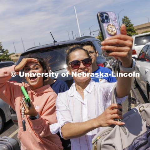 Gisell Duarte of Norfolk smiles for her a selfie by her mom, Maribel. Residence Hall move in for students participating in Greek Rush. August 14, 2022. Photo by Craig Chandler / University Communication.