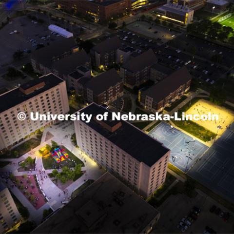 Nighttime aerial view of Harper Schramm Smith residence halls block party. August 18, 2022. Photo by Craig Chandler / University Communication.