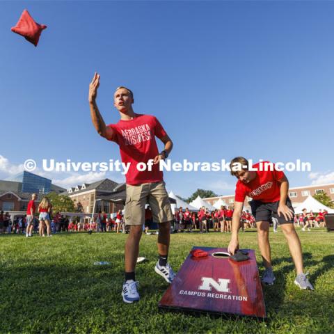 Students play cornhole on the lawn. Chancellor’s BBQ to welcome the class of 2026 in the greenspace by the Nebraska Union. August 19, 2022. Photo by Craig Chandler / University Communication.