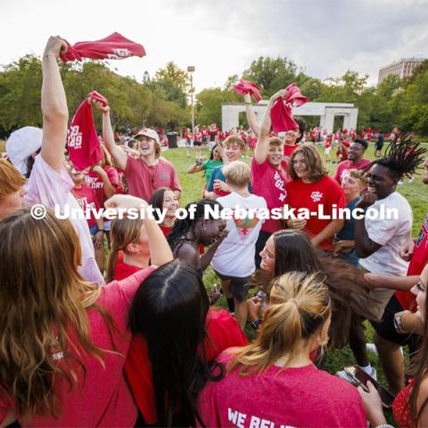 A group of students dance at the Chancellor’s BBQ to welcome the class of 2026 in the greenspace by the Nebraska Union. August 19, 2022. Photo by Craig Chandler / University Communication.