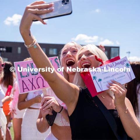 Sororities congregate to the Vine Street fields to participate in Sorority Rush Bid Day. Sorority bid day recruitment. August 20, 2022. Photo by Jordan Opp for University Communication
