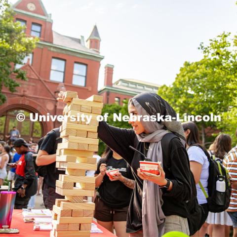 Students enjoy some Dairy Store ice cream at the College of Architecture Ice Cream Social outside of Architecture Hall. August 24, 2022. Photo by Jonah Tran/ University Communication