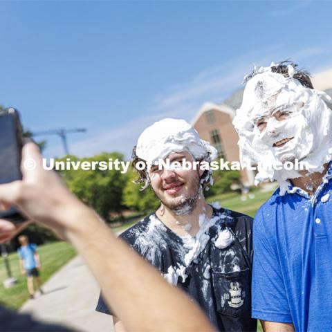 Acacia fraternity held a pie-in-the-face fundraiser for Bryan Health’s new cancer center. All the UNL fraternities are participating and have raised more than $200,000 so far this year. August 25, 2022. Photo by Craig Chandler / University Communication.