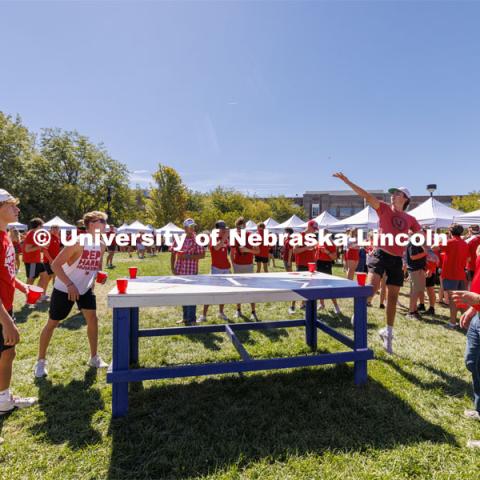 Students play Beer Die at the Student Tailgate and Unity Walk in the Union green space before the game. NU vs. North Dakota. September 3, 2022. Photo by Craig Chandler / University Communication.