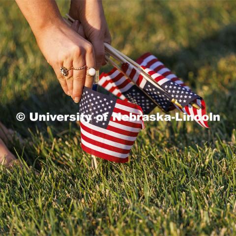 The Nebraska Military and Veteran Success Center, ASUN and others placed flags and signs on East Campus today to commemorate 9/11. The display will be moved to city campus on Monday. September 9, 2022. Photo by Craig Chandler / University Communication.