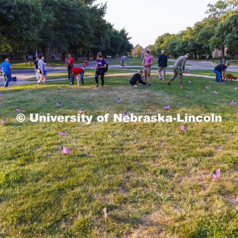 The Nebraska Military and Veteran Success Center, ASUN and others placed flags and signs on East Campus today to commemorate 9/11. The display will be moved to city campus on Monday. September 9, 2022. Photo by Craig Chandler / University Communication.