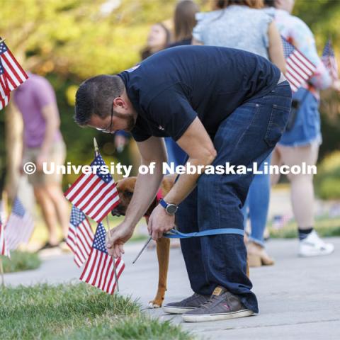 The Nebraska Military and Veteran Success Center, ASUN and others placed flags and signs on East Campus today to commemorate 9/11. The display will be moved to city campus on Monday. September 9, 2022. Photo by Craig Chandler / University Communication.