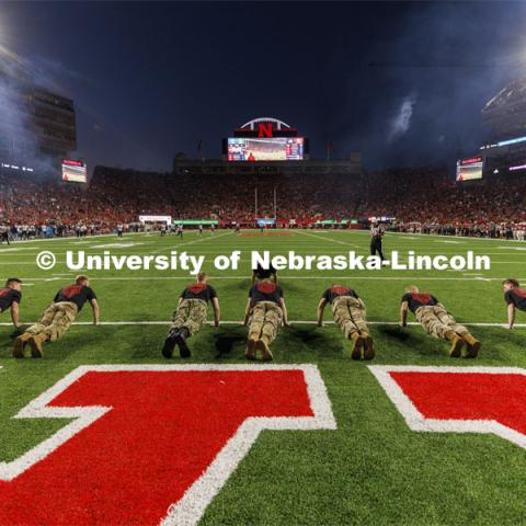 ROTC cadets and midshipmen do pushups for points after every touchdown. Nebraska vs. Georgia Southern football in Memorial Stadium. September 10, 2022. Photo by Craig Chandler / University Communication.