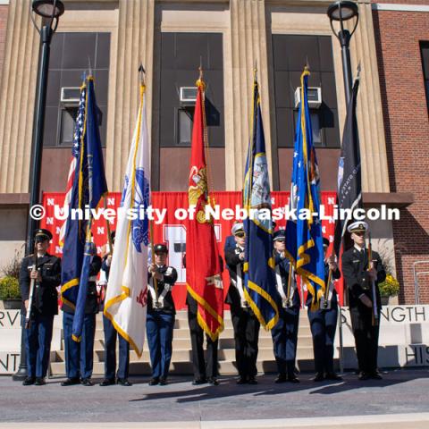 A color guard presents the flags during the dedication of the new Veterans Tribute. Veteran's Memorial Ceremony. Dedication of Veterans’ Tribute project outside Military and Naval Science building. September 11, 2022. Photo by Gus Kathol for University Communication.