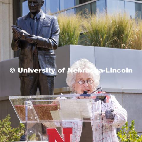 Ruth Scott talks to the crowd and describes how she worked for George Beadle’s dad when she was little and picked strawberries for a half cent per pint during the depression. Bill and Ruth Scott were honored at the dedication of the George Beadle statue at the Dinsdale Learning Commons on East Campus. September 13, 2022. Photo by Craig Chandler / University Communication.