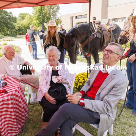 From left, Bill and Ruth Scott and Chancellor Ronnie Green pose with UNL Rodeo Club members Hallie Reeves, left, and Sydney Veldhuizen and their horses. Bill and Ruth Scott were honored at the dedication of the George Beadle statue at the Dinsdale Learning Commons on East Campus. September 13, 2022. Photo by Craig Chandler / University Communication.