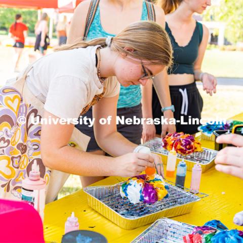 Students tie-dye “Peace, Love, Consent” t-shirt (while supplies last) and visit booths to learn more about CONSENT and how to ask for it. The event was sponsored by Center for Advocacy, Response and Education (CARE) and Big Red Resilience and Well-being. September 20, 2022. Photo by Jonah Tran/ University Communication.