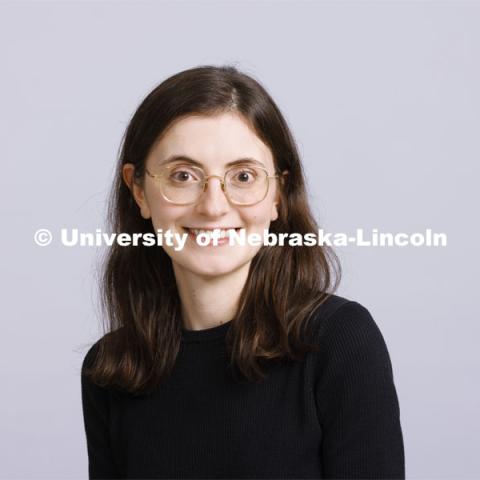 Studio portrait of Emma Gregoline, lectuer, graphic design at the School of Art and Art History. New Faculty and Staff. September 22, 2022. Photo by Craig Chandler / University Communication.