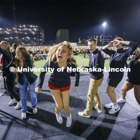Aleksandra Glowik and other Homecoming Royalty react to cheering from their friends who were waiting to perform on stage. Showtime at the Vine Street Fields. Recognized Student Organizations, Greeks and Residence Halls battle against each other with performances for Homecoming competition points and ultimate bragging rights. Homecoming 2022. September 26, 2022. Photo by Craig Chandler / University Communication.