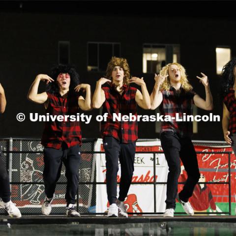 Members of Triad 9 (Alpha Gamma Rho, Pi Beta Phi and Theta Xi) perform on stage at Showtime at the Vine Street Fields. Recognized Student Organizations, Greeks and Residence Halls battle against each other with performances for Homecoming competition points and ultimate bragging rights. Homecoming 2022. September 26, 2022. Photo by Craig Chandler / University Communication.