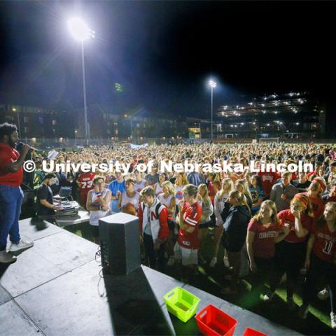 D-Wayne announces the winner to the crowd at Showtime at Vine Street Fields.  Homecoming 2022. Showtime at the Vine Street Fields. Recognized Student Organizations, Greeks and Residence Halls battle against each other with performances for Homecoming competition points and ultimate bragging rights. Homecoming 2022. September 26, 2022. Photo by Craig Chandler / University Communication.