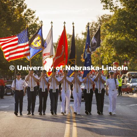 The ROTC color guard marches down R Street. Homecoming Parade and Cornstalk. September 30, 2022. Photo by Craig Chandler / University Communication.
