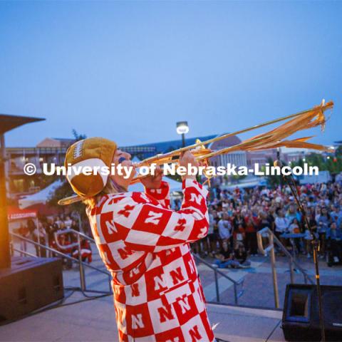 Claire Wackel of Tri-Delta sorority plays her trombone during the Jester Competition. Homecoming Parade and Cornstalk. September 30, 2022. Photo by Craig Chandler / University Communication.