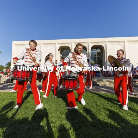 UNL Drumline gives a pregame performance outside the Sheldon Art Museum. Nebraska vs. Indiana football Homecoming game. October 1, 2022. Photo by Craig Chandler / University Communication.