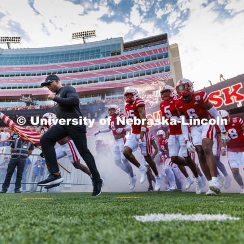 Interim coach Mickey Joseph leads the Husker football team onto the field. Nebraska vs. Indiana football Homecoming game. October 1, 2022. Photo by Craig Chandler / University Communication.