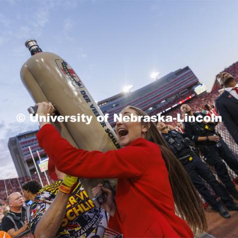 Members of the Homecoming Court get the chance to launch a hotdog with Der Viener Schlinger. Nebraska vs. Indiana football Homecoming game. October 1, 2022. Photo by Craig Chandler / University Communication.