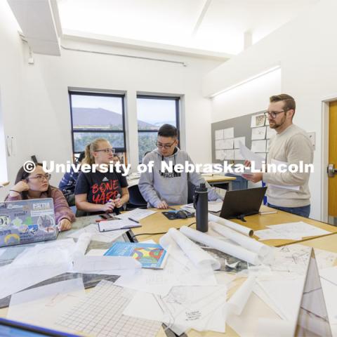 Assistant Professor Michael Harpster works with students in Design Studio. Design studios in Architecture Hall. October 12, 2022. Photo by Craig Chandler / University Communication.