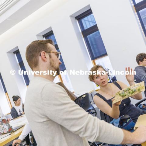 Assistant Professor Michael Harpster works with students in Design Studio. Design studios in Architecture Hall. October 12, 2022. Photo by Craig Chandler / University Communication.