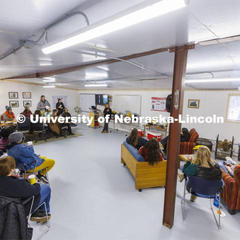 Sophia Perdikaris describes the Reller Praire to a group of counselors. The interior of the metal building has been remodeled into an attractive learning space. Academic counselors tour Reller Prairie in southwest Lancaster County. October 17, 2022. Photo by Craig Chandler / University Communication.