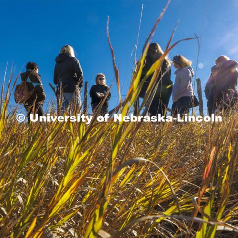 Sophia Perdikaris talks with academic counselors on a tour of Reller Prairie in southwest Lancaster County. October 17, 2022. Photo by Craig Chandler / University Communication.