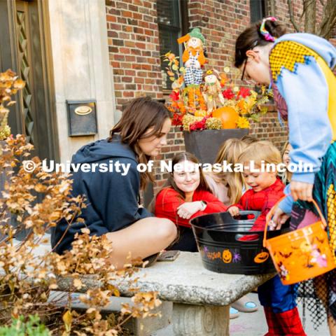 The university hosted a public Trick-or-Treat event in the Nebraska Union and at the chapter houses on Greek row. Greek Street Trick or Treat. October 28, 2022. Photo by Jonah Tran / University Communication.