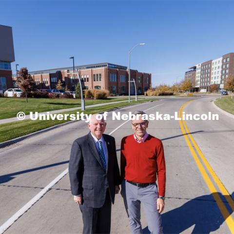 NIC Executive Director Dan Duncan and UNL Chancellor Ronnie Green standing Transformation Drive leading to Innovation Campus. October 31, 2022. Photo by Craig Chandler / University Communication.