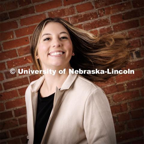 Studio portrait of Kateri Hartman, Copy Writer / Media Relations Associate, Office of University Communication. November 9, 2022. Photo by Craig Chandler / University Communication.