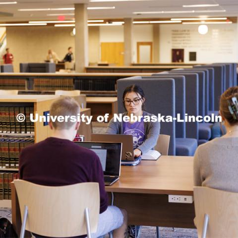 First year law student Paige Langley from Sydney, Nebraska, studies with friends in the renovated Schmid Law Library. November 10, 2022. Photo by Craig Chandler / University Communication.