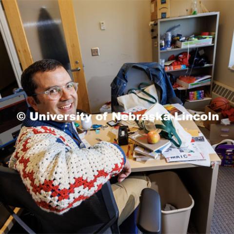 Gabe Brugier’s office in the Prem S. Paul Research Center at Whittier School overflows with supplies for the after-school program he runs in several middle schools. Bruguier, Education and Outreach Coordinator at the Mid-America Transportation Center, leads the MATC/NCIA Sovereign Native Youth STEM Leadership Academy. Gabriel is an enrolled member of the Yankton Sioux Tribe. November 11, 2022. Photo by Craig Chandler / University Communication.