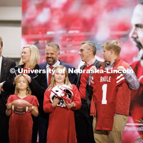 Husker head football coach Matt Rhule shares a laugh with Chancellor Ronnie Green as NU President Ted Carter talks with Rhule’s wife, Julie. In front of the group which includes NU athletic director Trev Alberts are Rhule’s children, Leona, Vivienne and Bryant, Rhule was introduced at a press conference in the Hawks Championship Center. November 28, 2022. Photo by Craig Chandler / University Communication.