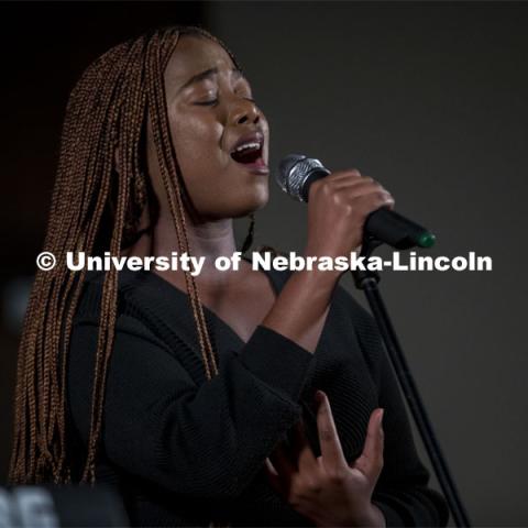 Starr (Ester) Uwamahoro member of Live Lyve sings at the MLK Commemorative Celebration program featured a keynote address from Tommie Smith and the awarding of the annual Chancellor’s “Fulfilling the Dream” Award. January 25, 2023. Photo by Blaney Dreifurst for University Communication. 