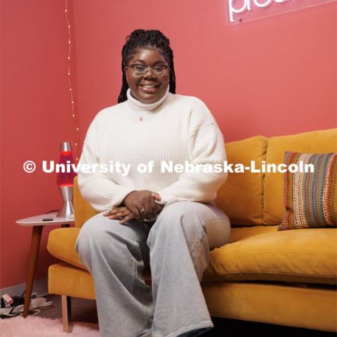 Odelia Amenyah smiles for a photo in the College of Journalism's Experience Lab. Amenyah is a senior in journalism and advertising/public relations, for Black History Month feature story. January 31, 2023. Photo by Craig Chandler / University Communication.