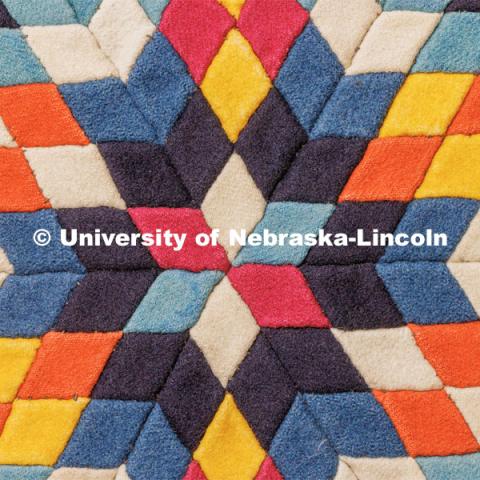 A detail from a soldier’s quilt possibly made in the United States in the period between 1880-1900. Quilt Center. February 8, 2023. Photo by Craig Chandler / University Communication.