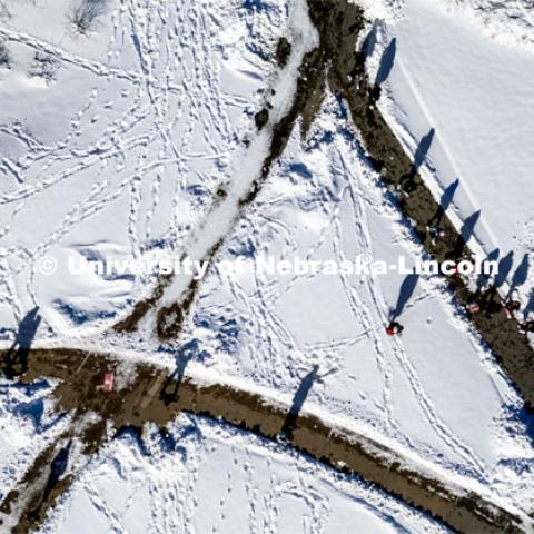 Aerial view of the snow on City Campus. A snowy Friday on city campus. February 17, 2023. Photo by Craig Chandler / University Communication. 