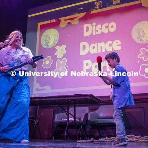 Ashton Sandman and Zayn Soerjawitaka perform at the 2023 HuskerThon. University of Nebraska–Lincoln students raised $118,208 during the annual HuskerThon on Feb. 25. Also known as Dance Marathon, the event is part of a nationwide fundraiser supporting Children’s Miracle Network Hospitals. The annual event, which launched in 2006, is the largest student philanthropic event on campus. The mission of the event encourages participants to, “dance for those who can’t.” All funds collected by the Huskers benefit the Children’s Hospital and Medical Center in Omaha. February 25, 2023. Photo by Blaney Dreifurst for University Communication.