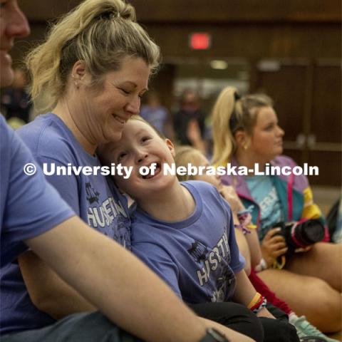 Braden Standage laughs to his mother, Shannon Standage during Huskerthon. University of Nebraska–Lincoln students raised $118,208 during the annual HuskerThon on Feb. 25. Also known as Dance Marathon, the event is part of a nationwide fundraiser supporting Children’s Miracle Network Hospitals. The annual event, which launched in 2006, is the largest student philanthropic event on campus. The mission of the event encourages participants to, “dance for those who can’t.” All funds collected by the Huskers benefit the Children’s Hospital and Medical Center in Omaha. February 25, 2023. Photo by Blaney Dreifurst for University Communication.