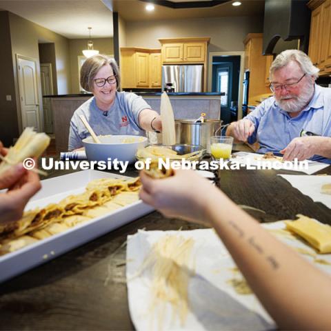 Sherri Jones, dean of college of education and human sciences, makes tamales in her home kitchen. The tamale session becomes a family affair as her husband, Tim, their daughters and their partners all help. She loves to cook for her family as a source of relaxation and is a proud Nebraska alumna having earned three degrees from UNL in 1985, 1987 and 1994. March 11, 2023. Photo by Craig Chandler / University Communication.