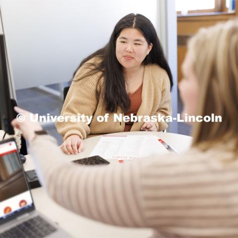 Academic Advisor Bethany Heaney works with a student. Explore Center photo shoot. March 22, 2023. Photo by Craig Chandler / University Communication. 