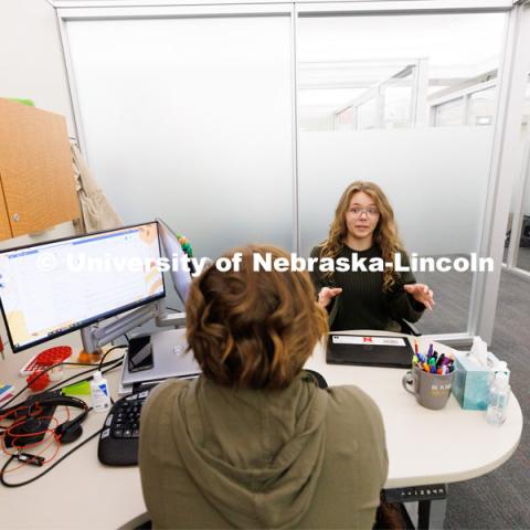 Laura Britten, Academic Navigator works with a student in the Explore Center. Explore Center photo shoot. March 22, 2023. Photo by Craig Chandler / University Communication. 